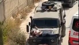 Izraelska vojska ranjenog Palestinca vezala za haubu džipa
